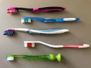 This image shows several toothbrushes that were used during our BrushBot testing phase.