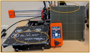 3D Printing for Beginners zoomed in image of the Prusa Mini's PEI 3D print bed.